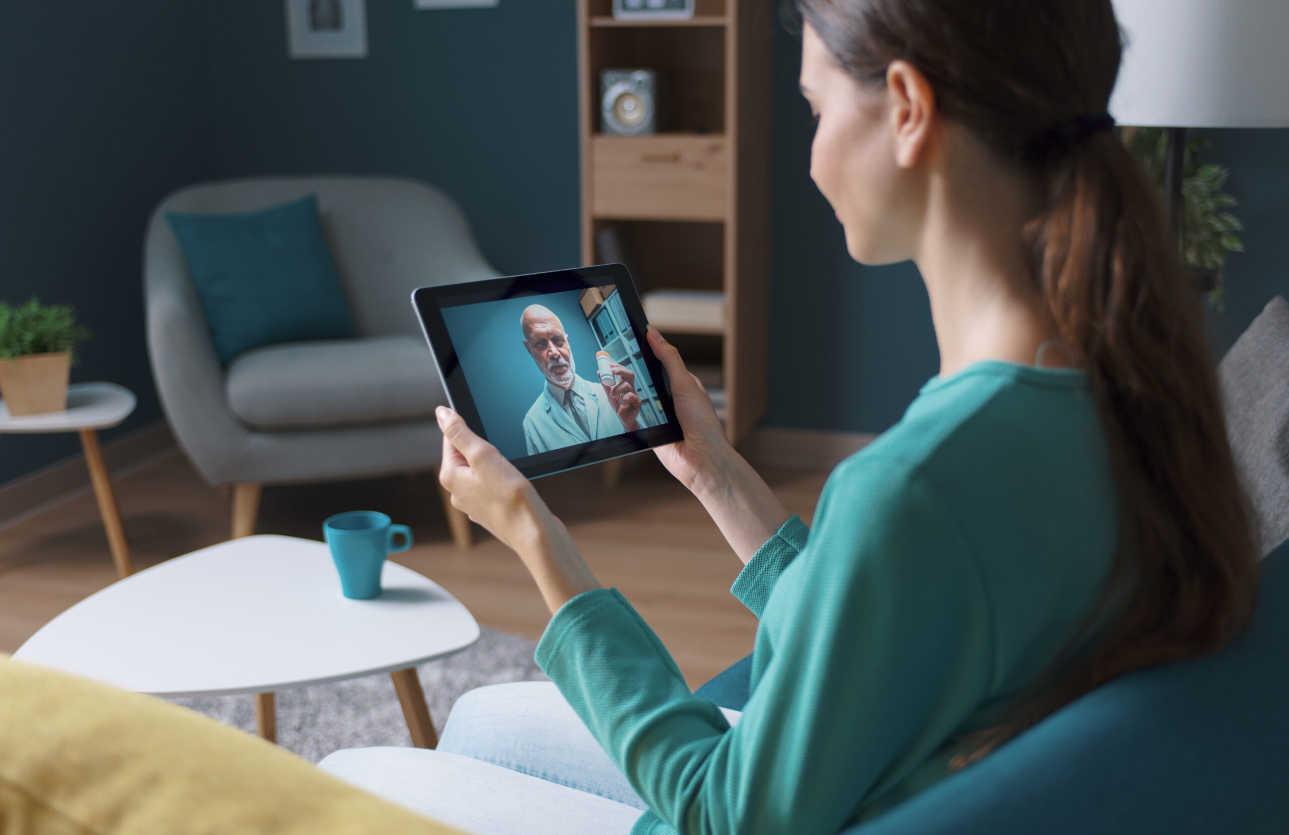 Woman having a video call with her doctor
